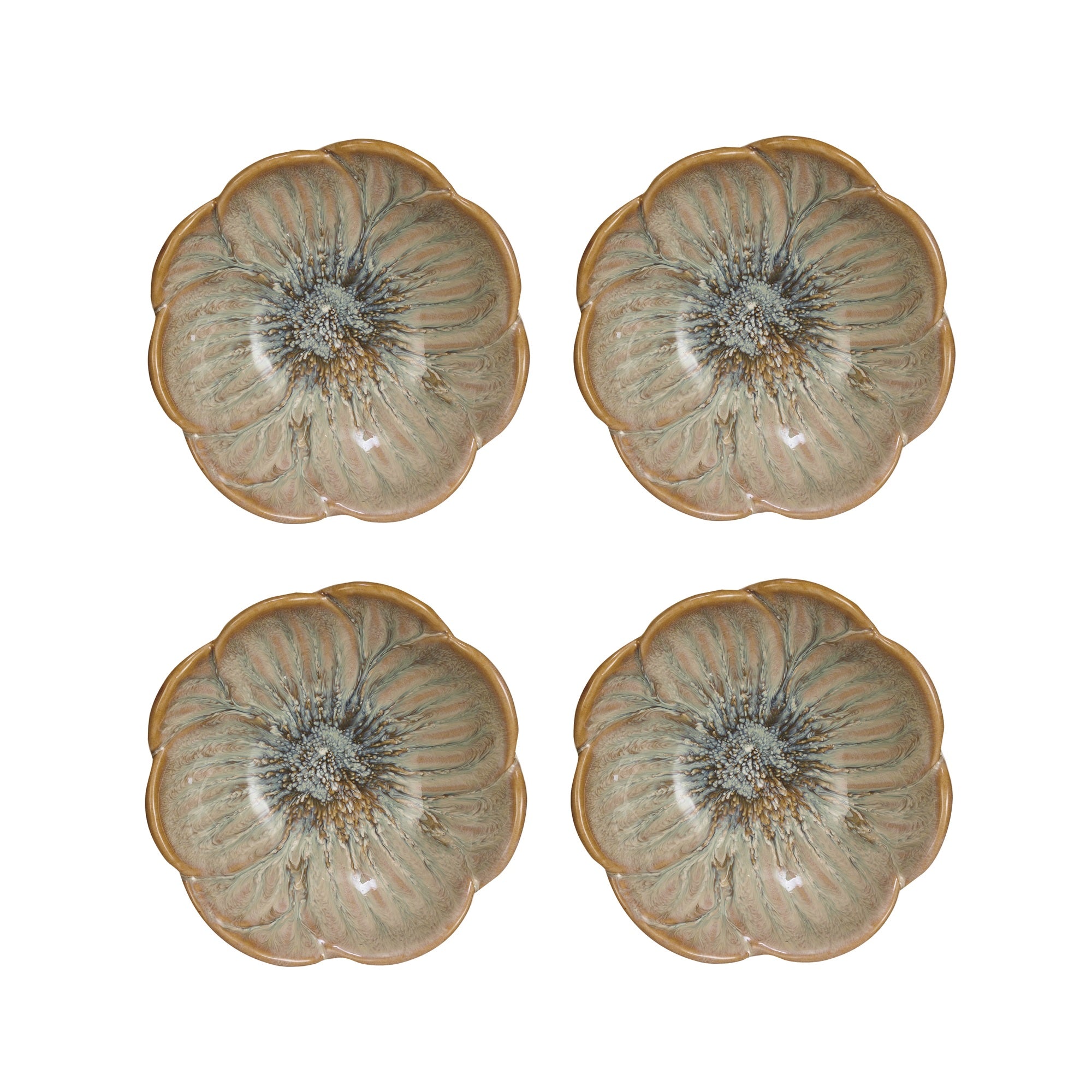 A set of four stoneware bowls with a blue floral pattern and reactive glaze.